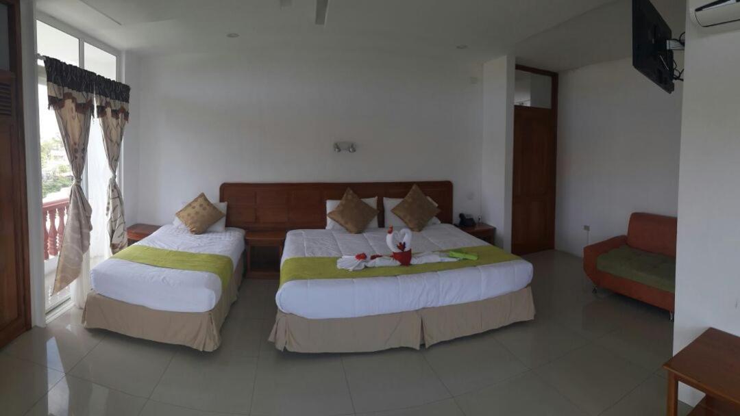 Hotel Dejavu ปูแอร์โตอาโยรา ภายนอก รูปภาพ
