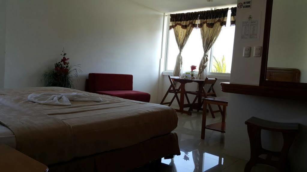 Hotel Dejavu ปูแอร์โตอาโยรา ภายนอก รูปภาพ