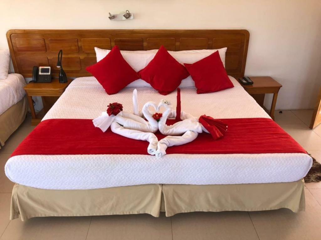 Hotel Dejavu ปูแอร์โตอาโยรา ภายนอก รูปภาพ